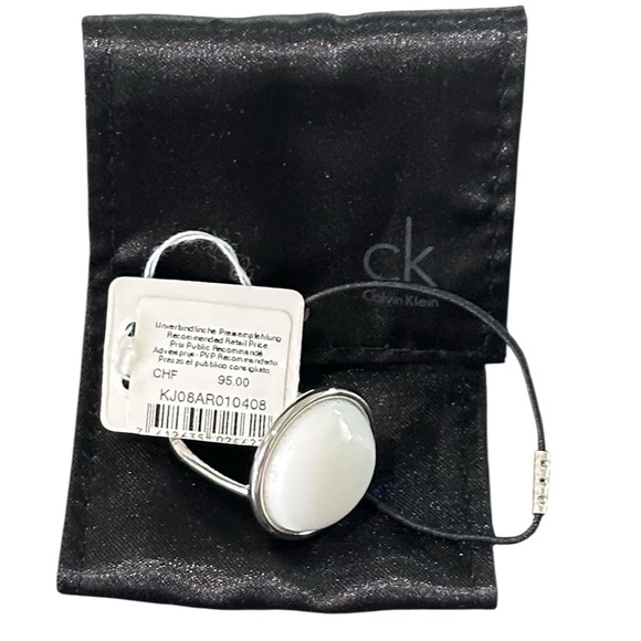 Calvin Klein NWT Loop Two Tone Ring with a Round White Coral Stone Size 9 - Picture 4 of 8